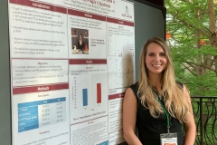 Carla Wall presenting a poster at the 2019 Gatlinburg Conference