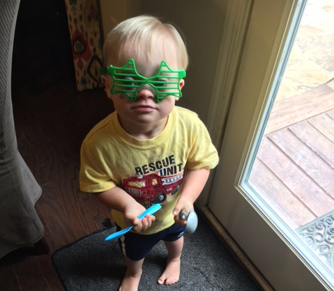 One of our child participants wearing some stellar star glasses!